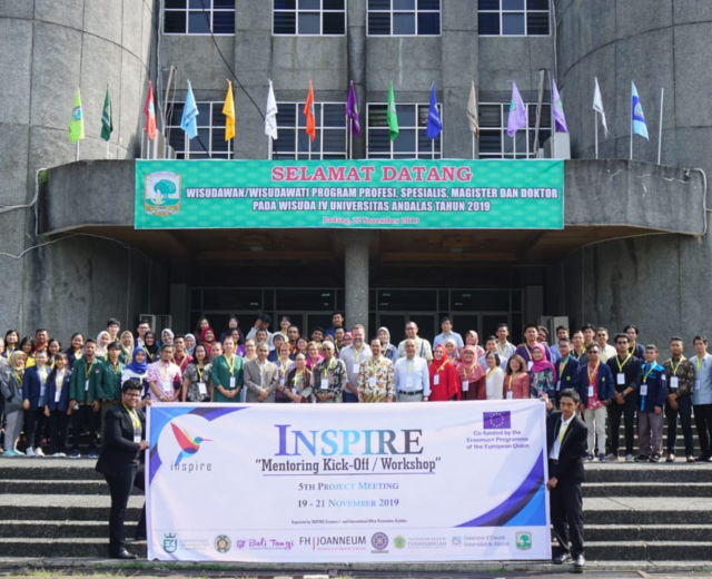 Participants of the INSPIRE Mentoring Kick-Off / Workshop and 5th Project Meeting Taking a picture in front of the Andalas University Auditorium.